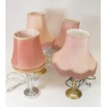 A pair of brass table lamps together with two others. (4)