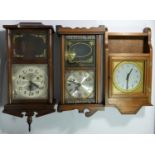 A collection of clocks to include, an Acctim 31 day wall clock, a Highlands 31 day wall clock,