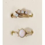 A 9ct gold opal single stone ring, J and another opal ring, K, 2.1gm