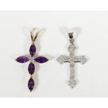 An amethyst and diamond cross pendant and a 9ct white gold and diamond cross pendant