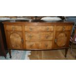 A mahogany & burr walnut veneer sideboard server, bow fronted with three graduated drawers,