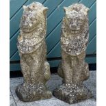 A pair of composite seated lions (2)