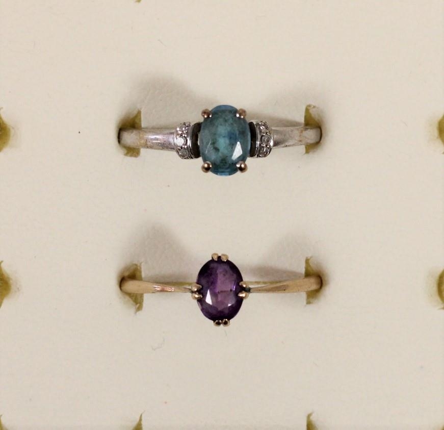 A 9ct white gold, probably blue topaz and diamond ring, P 1/2 and a 9ct gold amethyst ring, R, 3gm