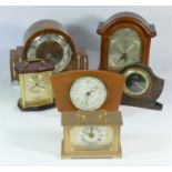 A collection of clocks to include, a Acctim mantel clock, a Metamec mantel clock, together with