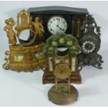 A collection of clocks to include, oak cased mantel clocks, a gilt metal clock case and others (2)