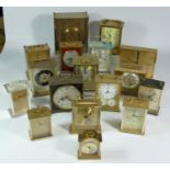 A collection of clocks to include, three lantern clock, a Seiko quartz carriage clock, together with