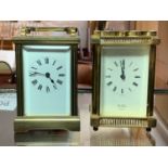 A brass carriage clock, white dial with Roman numerals, St James of London, together with a