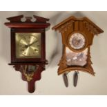 Three wall clocks to include, a cuckoo clock, a Highlands wall clock, and another similar wall clock