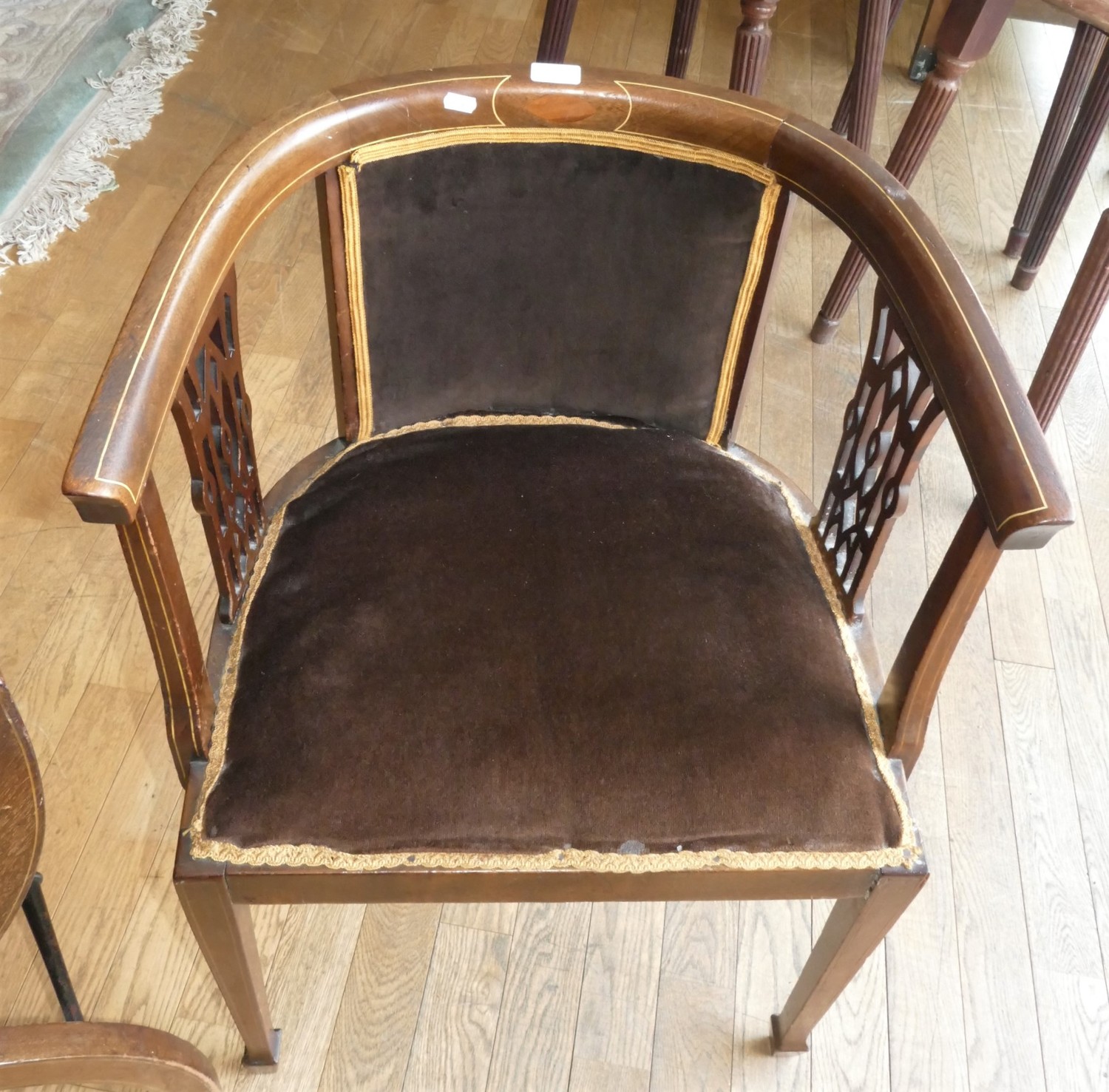 An Edwardian tub chair in mahogany with inlay to the legs and arms, shaped supports to the arms - Image 3 of 4