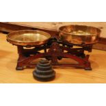 An early 20th Century set of cast metal & brass scales - stamped 'Made In Hungary' complete with a