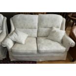 A three piece suite consisting of three seater & two seater sofa's and a armchair, upholstered in