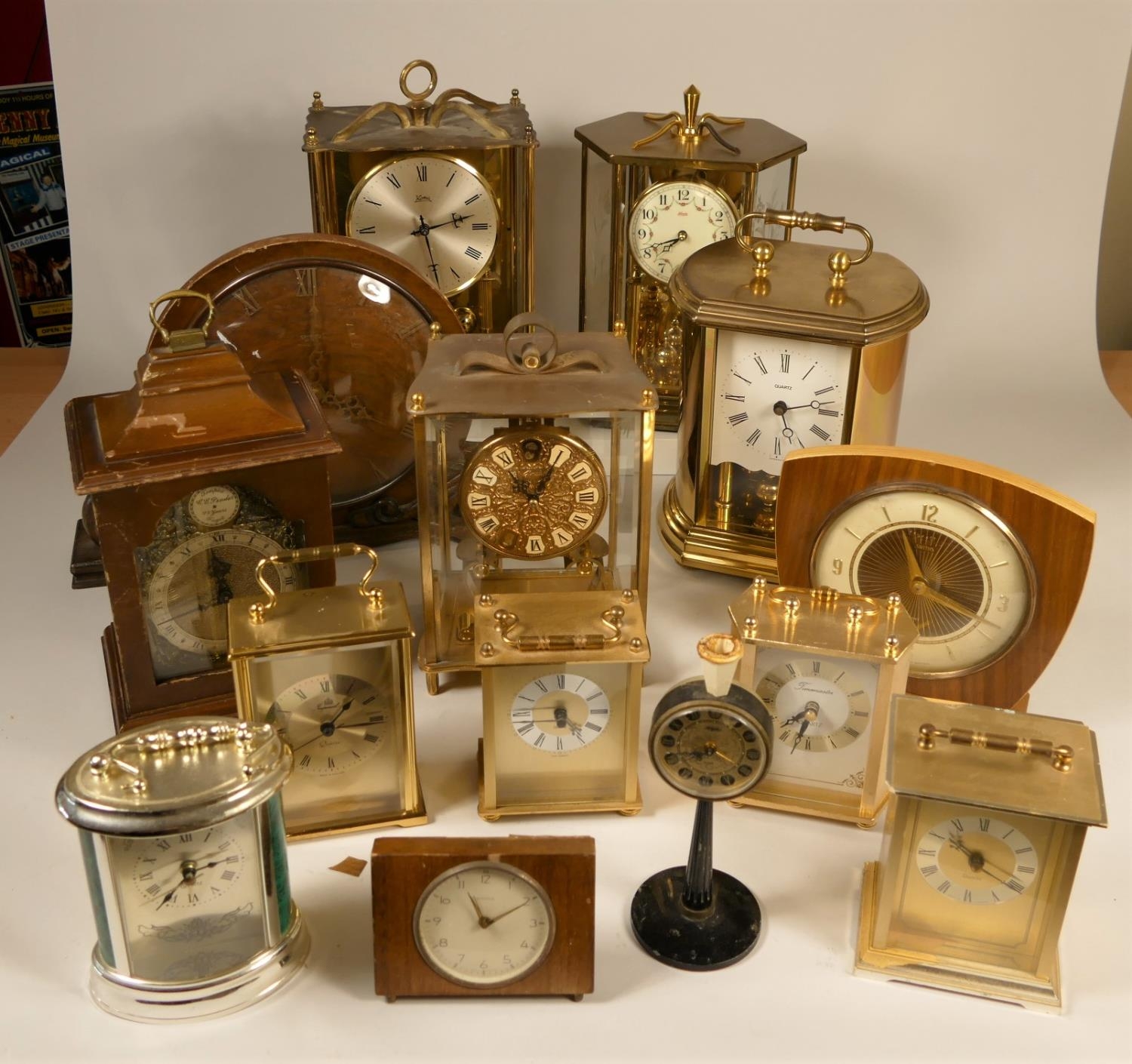 A collection of clocks to include, an Imperial quartz clock, a Kundo anniversary clock, together