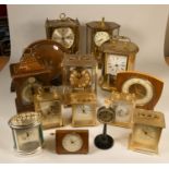 A collection of clocks to include, an Imperial quartz clock, a Kundo anniversary clock, together