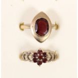 A 9ct gold garnet panel ring R and a 9ct gold garnet cluster ring, N, 5.2gm