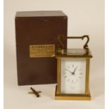A Comitti, London Cromwell brass carriage clock, c.1977, model C088TP, the 7 jewel movement signed