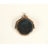 A 9ct rose gold swivel fob, Birmingham 1916, set with bloodstone and cornelian, 20mm, 6.3gm.