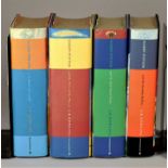 J.K Rowling four hard back first editions of the Harry Potter Saga to include, Harry Potter and