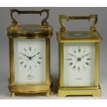 A brass ogee carriage clock, the enamel dial signed Manis, London, the movement signed Fema, London,