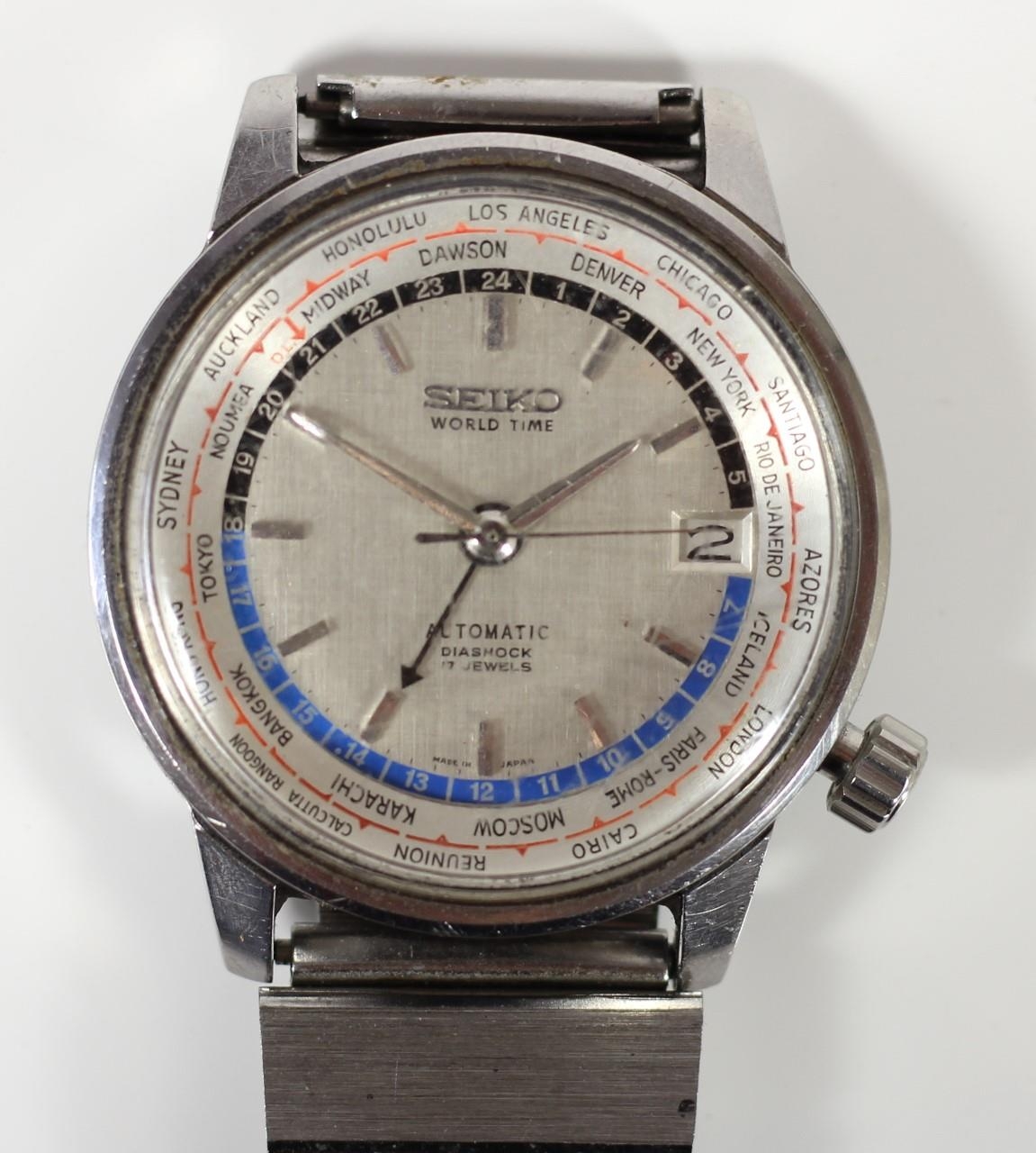 Seiko, a stainless steel Tokyo Olympic World Time Automatic Diashock wristwatch, ref. 6217-7000, c.