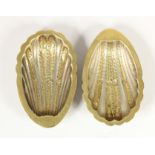 A pair of silver and gilt shell dishes, stamped SILVER, with embossed decoration, 11.5 x 7.5cm, 2.