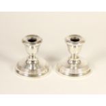 A pair of silver desk candlesticks, Birmingham 1970, 8cm, loaded