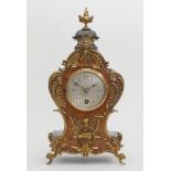 A German Lenzkirch Louis XVI style burr walnut and ebonised mantle clock, with gilt applied
