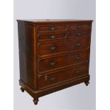 A Georgian mahogany campaign chest of drawers, in two sections