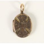 A Victorian gold locket with engraved and embossed cross motif, 25 x 20mm, 5.2 gm