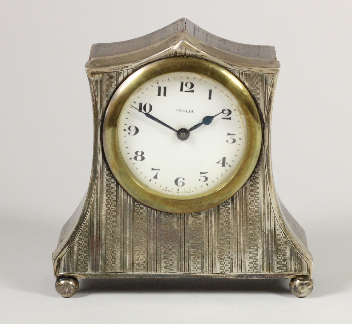 A silver mounted boudoir clock, Birmingham 1924, the white dial signed Veglia, with engine turned