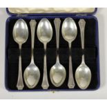 A silver set of six bead edge tea spoons, Birmingham 1933, 3.5oz, case