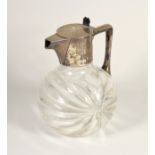 An Edwardian silver mounted glass claret jug, by John Heath & John Middleton, London 1903, the