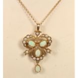 A 9ct gold diamond, opal and half pearl Victorian style brooch/pendant, London 1987, 38 x 24 mm,