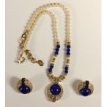 Christian Dior, a Revelie faux lapis lazuli, pearl, sapphire, diamond and gold necklace/pendant with