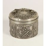 A German silver circular box, by Storck & Sinsheimer, Hanau, c.1900, pseudo marks, pull off cover,