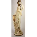 A large Royal Worcester figurine of a lady Grecian water carrier, c.1905, blush ivory dress with