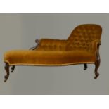 A Victorian mahogany chaise longue, with serpentine front, raised on cariole legs with brass