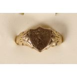A 9ct gold shield shape signet ring, Birmingham 1971, Y, 8.3gm
