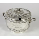 A Victorian silver two handled porringer and cover, by Nathan & Hayes, Chester 1898, with embossed