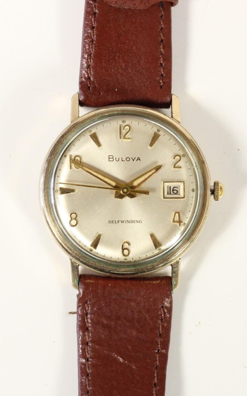 Bulova self winding, a gold plated automatic date gentleman's wristwatch, the silvered dial with