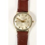 Bulova self winding, a gold plated automatic date gentleman's wristwatch, the silvered dial with