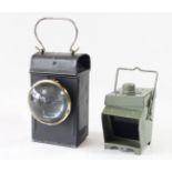 A small LMS cart lamp, with burner and a small green lamp of unknown origin