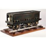 A tender from a 5" gauge live stream locomotive, presented on a length of track, secured to a