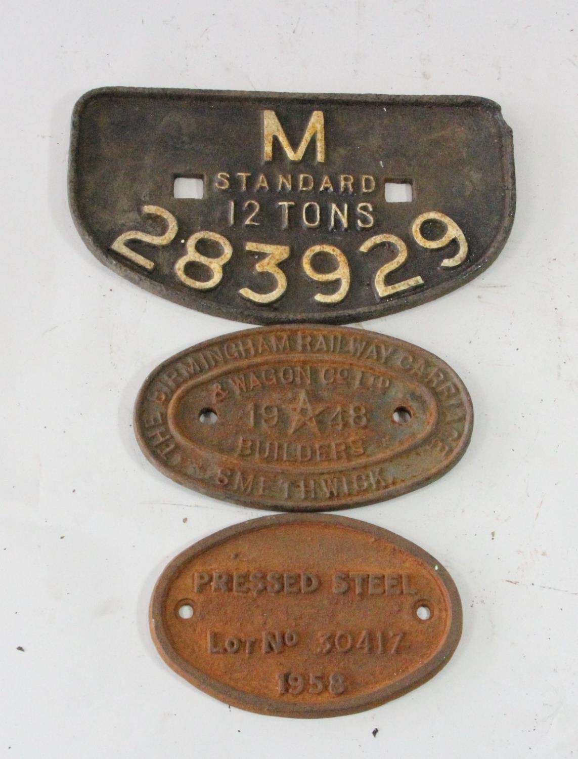 A 'D' wagon plate, M 12 tons 283929 and 2 small oval wagon plates, Birmingham R.C.&W Co.LTD,