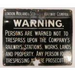 An enamel London Midland & Scottish Railway Co. tresspass warning sign, 46 x 56 cm