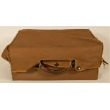 An early leather bound traveling case & contents to include, four family picture albums from the