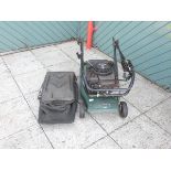 A Hayter Harrier 41 rotary lawn mower, auto drive with Briggs & Stratton engine.