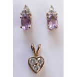 A 9ct gold a diamond three stone heart pendant, approximately 0.15ct and a pair of amethyst and