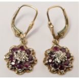 A pair of 9ct ruby and diamond cluster ear rings, 5.1gm