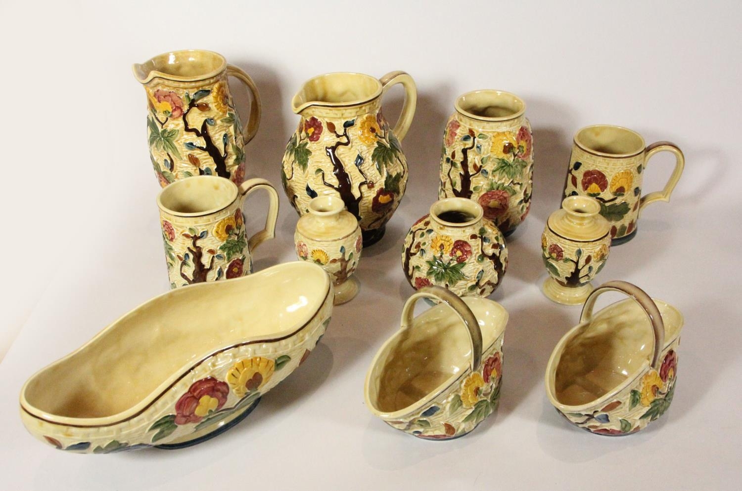 Sixteen pieces of Indian pottery to include, water jugs, flower vases, fruit bowl, platter and