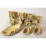 Sixteen pieces of Indian pottery to include, water jugs, flower vases, fruit bowl, platter and